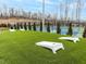 Fun outdoor game area with cornhole boards and manicured landscaping at 40 Wabash St, Pittsboro, NC 27312