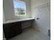 Spacious laundry room with countertop and sink at 40 Wabash St, Pittsboro, NC 27312