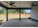 Covered patio with ceiling fans is perfect for outdoor entertaining at 40 Wabash St, Pittsboro, NC 27312