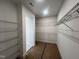 Spacious walk-in closet with white walls and wire shelving for optimal organization at 40 Wabash St, Pittsboro, NC 27312