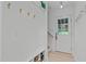 Mudroom with white trim, storage, and exterior door at 401 Brinkman Ct, Raleigh, NC 27614