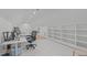 Well-lit home office featuring modern built-in shelving, hardwood floors, and a professional workspace setup at 401 Brinkman Ct, Raleigh, NC 27614