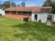 Expansive backyard featuring lush green grass and a well-maintained lawn at 407 N Cheatham St, Franklinton, NC 27525
