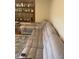 Relaxing space with a sectional sofa and decorative shelving at 407 N Cheatham St, Franklinton, NC 27525