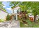 Charming home with well-manicured lawn, inviting front porch, and beautiful landscaping at 4125 Palafox Ct, Raleigh, NC 27604