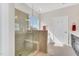 Bright bathroom featuring a glass-enclosed shower with built-in bench seating at 4333 Benton Mill Dr, Fuquay Varina, NC 27526