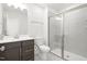 Bathroom with vanity, toilet, and glass-enclosed shower at 4333 Benton Mill Dr, Fuquay Varina, NC 27526
