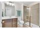 Bathroom with a single sink vanity and glass enclosed shower at 4333 Benton Mill Dr, Fuquay Varina, NC 27526