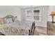 Bedroom featuring a metal bed frame and a window providing natural light at 4333 Benton Mill Dr, Fuquay Varina, NC 27526