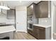 Modern kitchen features gray cabinetry, stainless steel appliances, white subway tile, and hard surface countertops at 4333 Benton Mill Dr, Fuquay Varina, NC 27526