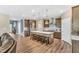 Spacious kitchen with stainless appliances, a large island with bar stool seating, and ample lighting at 4333 Benton Mill Dr, Fuquay Varina, NC 27526