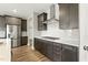 The Kitchen features stainless appliances, gray cabinets, and a gas stovetop at 4333 Benton Mill Dr, Fuquay Varina, NC 27526