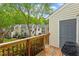 Charming balcony with wooden railing offers a peaceful retreat surrounded by lush greenery at 4617 Fawnbrook Cir, Raleigh, NC 27612