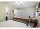 Bedroom featuring an ensuite bathroom and a workspace with desk at 4617 Fawnbrook Cir, Raleigh, NC 27612