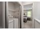 Convenient laundry area next to bedroom offers practicality and ease for everyday living at 4617 Fawnbrook Cir, Raleigh, NC 27612