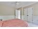 Comfortable bedroom with two closets and a soft carpet, perfect for relaxing and unwinding in a cozy atmosphere at 4711 Buttonbush Dr, Durham, NC 27712