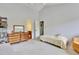 Bedroom with neutral carpet and light gray walls at 4711 Buttonbush Dr, Durham, NC 27712