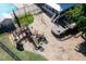 Aerial view of the community playground area with slides and swings at 4711 Buttonbush Dr, Durham, NC 27712