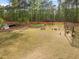 Open community space offers picnic area and outdoor fire pit for entertaining in the neighborhood at 484 Autumn Rain St, Cary, NC 27519