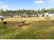 Enjoy community area with wooden pergola, picnic tables and outdoor grills, for easy entertaining at 484 Autumn Rain St, Cary, NC 27519