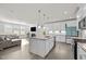 Spacious kitchen featuring a large island and open floorplan at 484 Autumn Rain St, Cary, NC 27519
