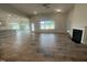 Open-concept floor plan with living room, kitchen, and dining area at 50 Watermelon Dr, Franklinton, NC 27525
