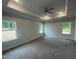 Main bedroom featuring carpet, ceiling fan, recessed lighting, and natural light at 50 Watermelon Dr, Franklinton, NC 27525