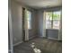 Bedroom with neutral walls, carpet, and two large windows providing natural light at 5033 Amber Clay Ln, Raleigh, NC 27612