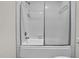 Full bathroom with a shower-tub combination and tiled walls at 505 Gooseneck Dr # A1, Cary, NC 27513