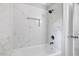 Beautiful bathroom features a shower with marble-look tiling, plus a recessed niche shelf at 515 Oakwood Ln, Graham, NC 27253
