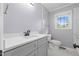 Modern bathroom with a vanity, providing a clean and refreshing space at 515 Oakwood Ln, Graham, NC 27253