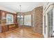 Charming nook with brick accents, natural light, and built-in cabinetry near backyard at 528 Bankhead Dr, Cary, NC 27519