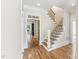 Beautiful staircase with wood treads, rod iron spindles, and modern finishes at 528 Bankhead Dr, Cary, NC 27519