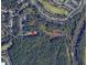An aerial view of property location near Bridges Lake and Neuse River Greenway Trail with lush surrounding trees at 5420 Royal Troon Dr, Raleigh, NC 27604