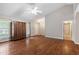 Bright living room with laminate flooring, and natural lighting that creates a warm and inviting atmosphere at 5420 Royal Troon Dr, Raleigh, NC 27604