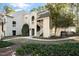 Well-maintained condo building featuring a charming exterior and landscaped surroundings at 6011 Winterpointe Ln # 205, Raleigh, NC 27606