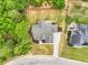 New Construction single Gathering home featuring newly seeded yard, landscaping, and a private outdoor living space at 669 Balmoral St, Clayton, NC 27520