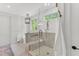 Bright bathroom with glass shower, tile floors, and custom cabinets at 669 Balmoral St, Clayton, NC 27520