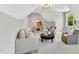 Bonus room with cozy seating, dormer window, and serene, neutral decor at 669 Balmoral St, Clayton, NC 27520