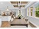 Stylish dining room featuring a wooden table, elegant chairs, and custom ceiling design at 669 Balmoral St, Clayton, NC 27520