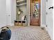 Charming entryway with brick flooring, a wooden door, and a built-in bench with storage at 669 Balmoral St, Clayton, NC 27520
