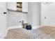Functional laundry room with upper cabinets, brick flooring, and utility connections at 669 Balmoral St, Clayton, NC 27520