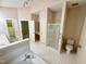 Spacious bathroom featuring a glass shower and toilet at 6715 St Johns Ct, Raleigh, NC 27616