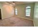 Spacious bedroom with vaulted ceiling, carpet and windows at 6715 St Johns Ct, Raleigh, NC 27616