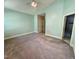 Bright bedroom with neutral walls, carpet and trim at 6715 St Johns Ct, Raleigh, NC 27616