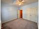 This bedroom features carpeted floors, a ceiling fan and a closet for storage at 6715 St Johns Ct, Raleigh, NC 27616