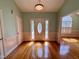 Bright foyer featuring hardwood floors and natural light at 6715 St Johns Ct, Raleigh, NC 27616
