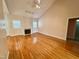 Spacious living room with vaulted ceilings, fireplace, and an abundance of natural light at 6715 St Johns Ct, Raleigh, NC 27616