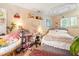 Cozy bedroom space with fun decor and a cozy sitting area at 7313 Longstreet Dr, Raleigh, NC 27615