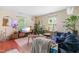 Bright living room with stylish decor, including plants and modern furniture at 7313 Longstreet Dr, Raleigh, NC 27615